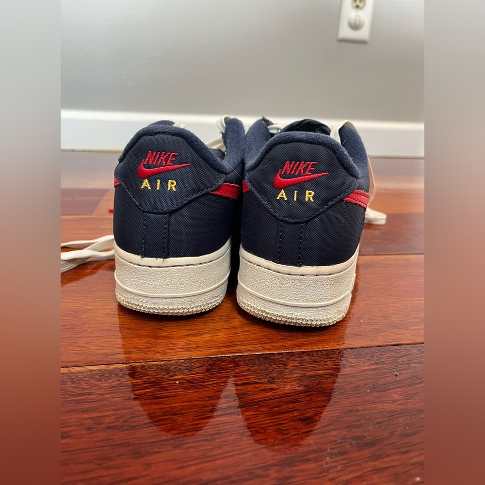 Nike Airforces in red white and blue. Women’s size 8, in decent condition.